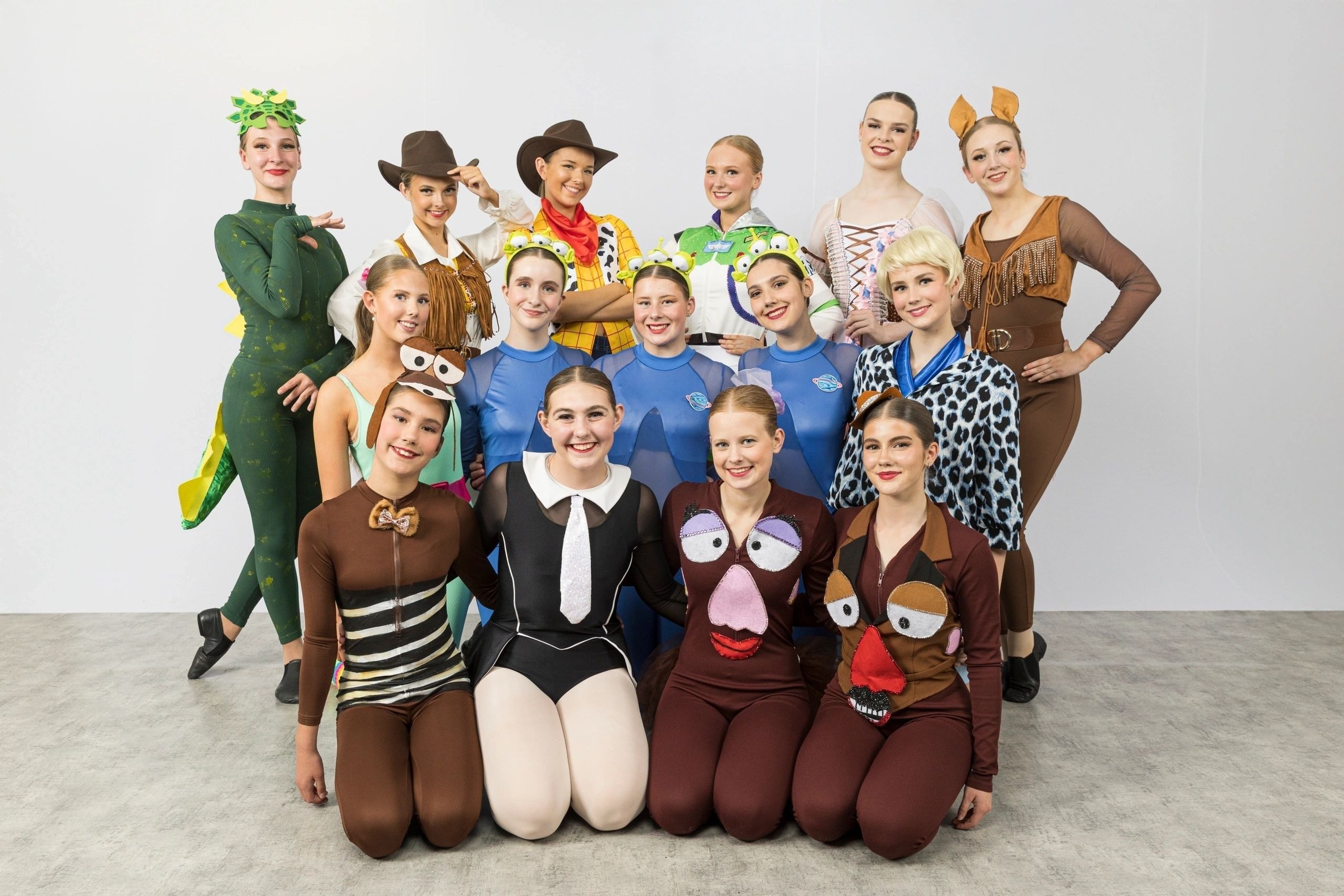 Dare to Dance Canberra group in Toy Story costumes including Woody, Buzz, Rex and Mr Potato Head